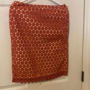 Size 4 skirt H&M. Tag gone. Lacy cutout flowers tan underskirt. Dark orange